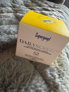 Supergoop! Daily Screen Hydrating Cream in Yellow and White Box